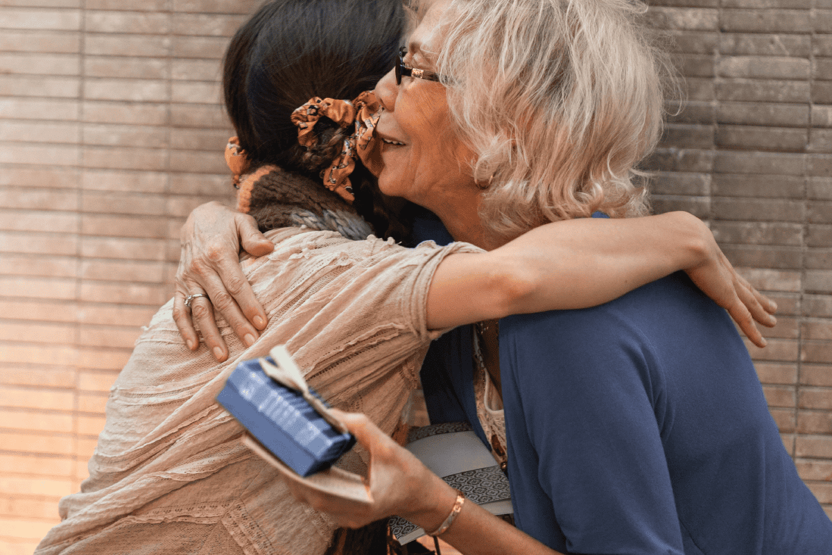 Two women hugging on Mother's day.
