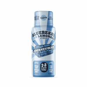 A blue 60ml bottle of the Blueberry THC syrup from Journey Man.